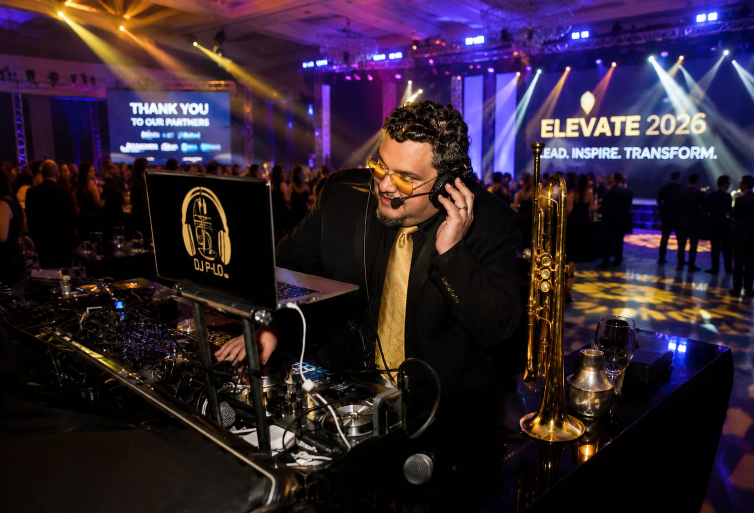 DJ P-LO providing DJ and live music entertainment at a corporate event